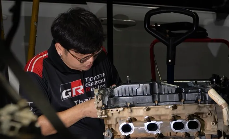 Anawat working on competition vehicles
